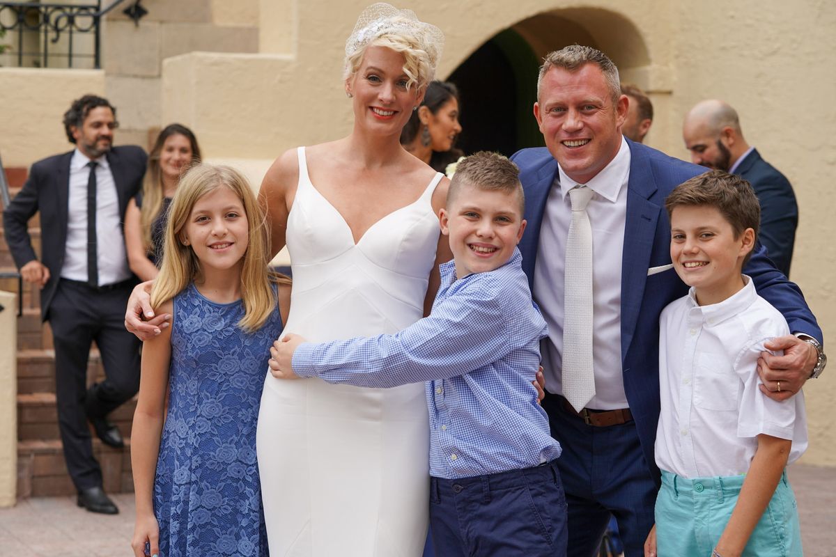 The couple celebrate with their children and family after the ceremony
